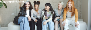 Group of happy young girls laughing and smiling while enjoying each other's company